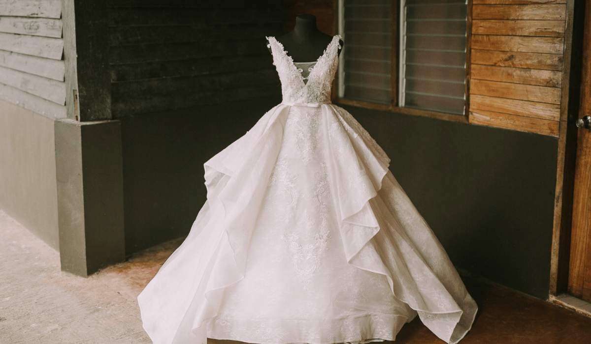 wedding dress box west islip White lace ball gown wedding dress on a mannequin — professional wedding gown preservation and cleaning service on Long Island